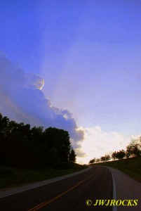 Clouds and Sunbeams Going Home